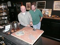 Our resident artist, Jerry Armstrong, showing Sean his Mars lander diorama